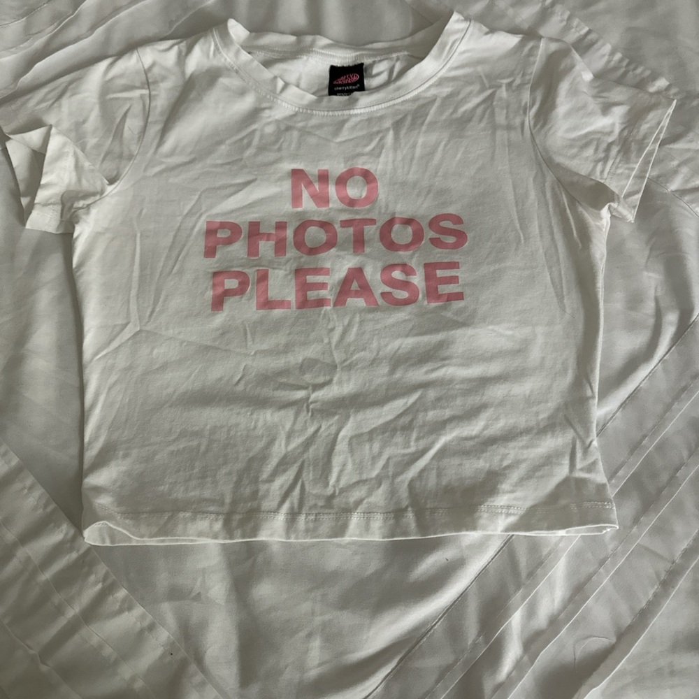 White T-shirt with Pink graphic, never worn, bought recently!!